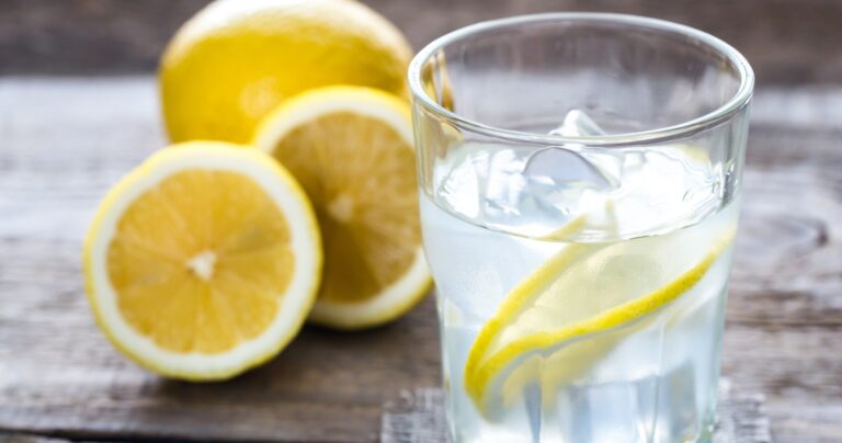 Water glass with lemon