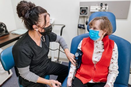 nurse working with a woman